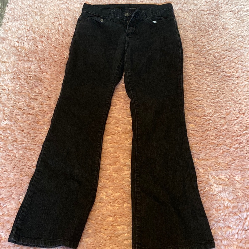 Calvin Klein black flare jeans.